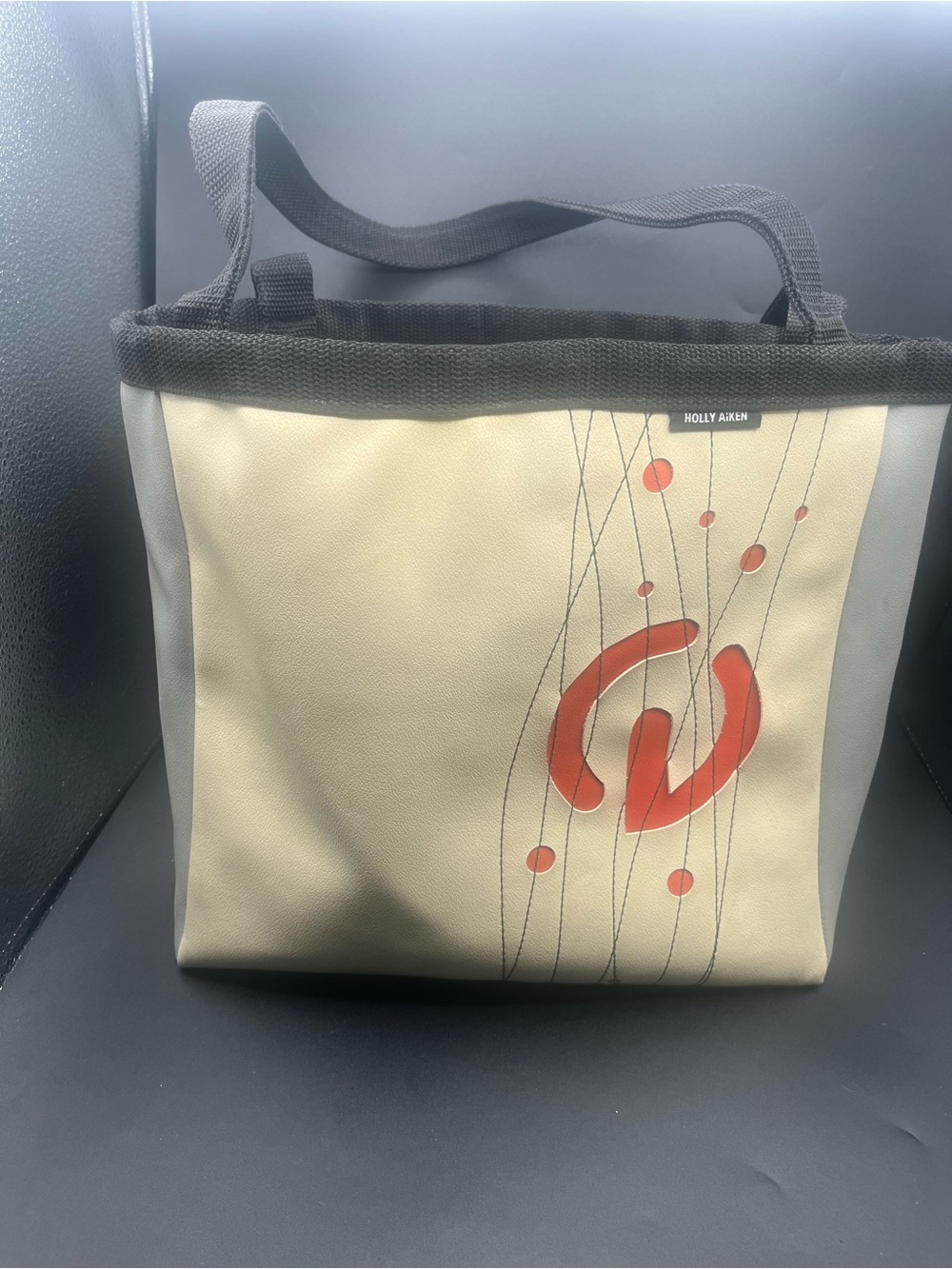Holly Aiken Beige Tote with Orange Graphic Accent